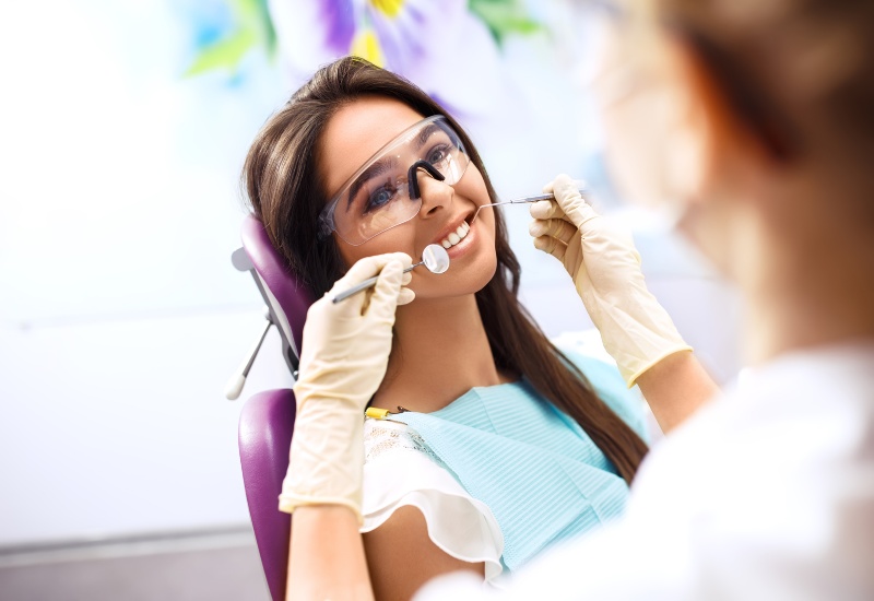 A smiling patient during a dental check-up, showcasing general dentistry benefits in Brookfield, WI